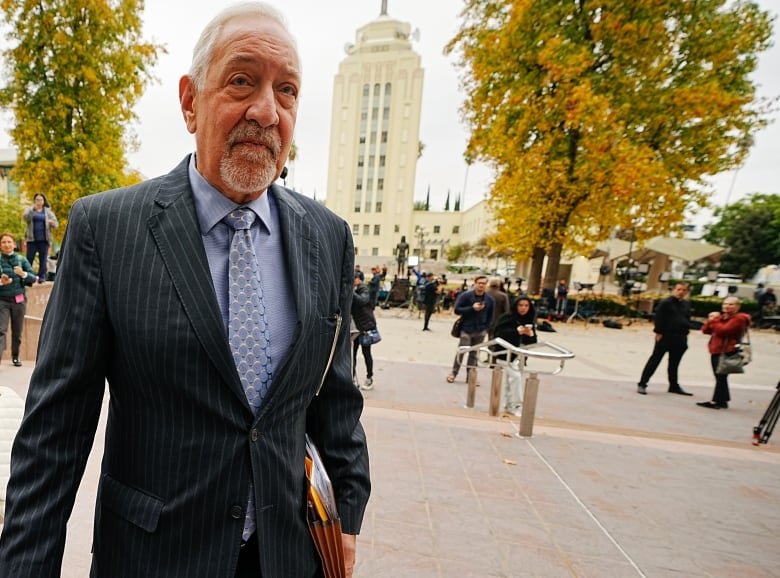 Defence attorney Mark Geragos arrives at a Los Angeles courthouse for a hearing for Erik and Lyle Menendez.