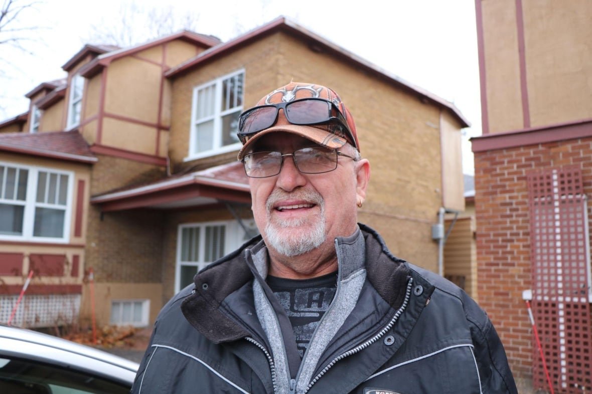 bagger-patient-navigator-image-6-1 A man smiling outside of a building.