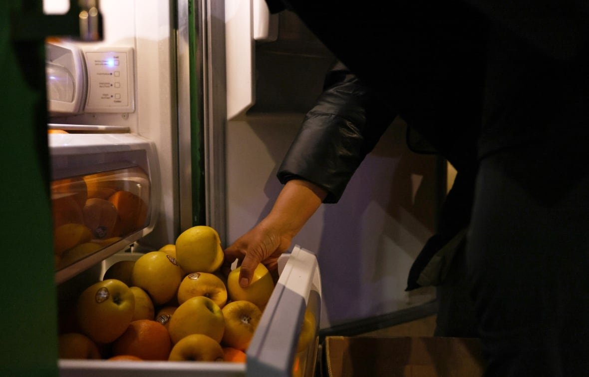 fridge Apples in a refrigerator bin.