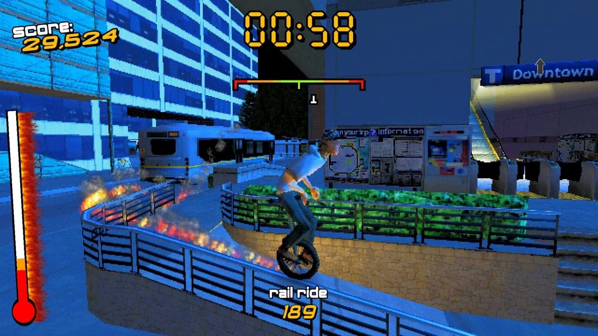 street-uni-x-1 A video game character unicycles down a ramp, flames emanating from their vehicle, as the entrance to 'Downtown' SkyTrain situation is behind them.