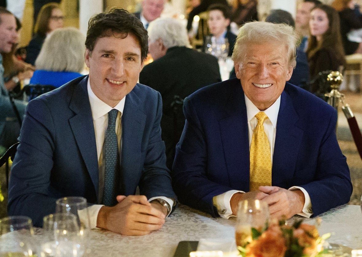 trudeau-and-trump-1 Prime Minister Justin Trudeau and President Donald Trump are sitting next to each other at a dinner table in Palm Beach, Florida.