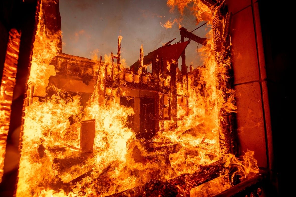 california-wildfires-4 A ferocious fire on a structure is shown in closeup.