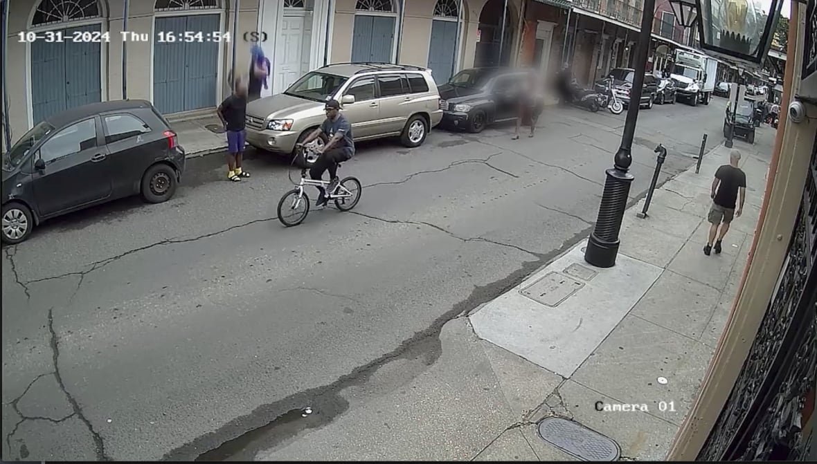 fbi-released-image-said-to-show-shamsud-din-jabbar-riding-a-bike-in-new-orleans-on-oct-31-2024 An image released by the U.S. Federal Bureau of Investigation that it says shows Shamsud-Din Jabbar riding a bicycle in the French Quarter in New Orleans on Oct. 31, 2024.