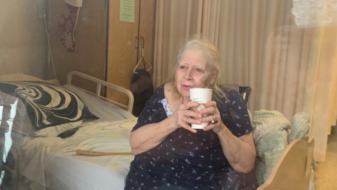 myrna-foat-1 Myrna Foat, pictured here in her room at Country Terrace during a window visit with her family during the COVID-19 pandemic. Froat's mother in law said there were not enough home care supports to allow the family to care for Froat in the family home.