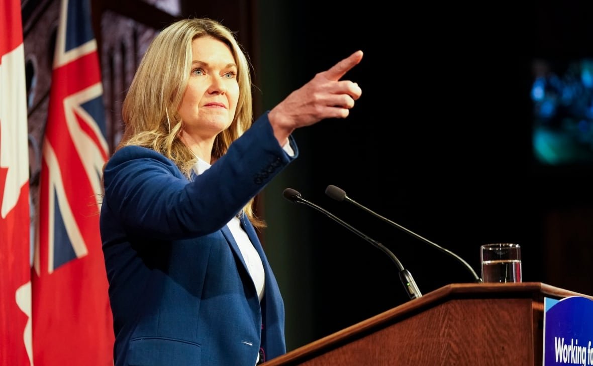 ont-colleges-universities-20240226 Jill Dunlop points during a press conference.