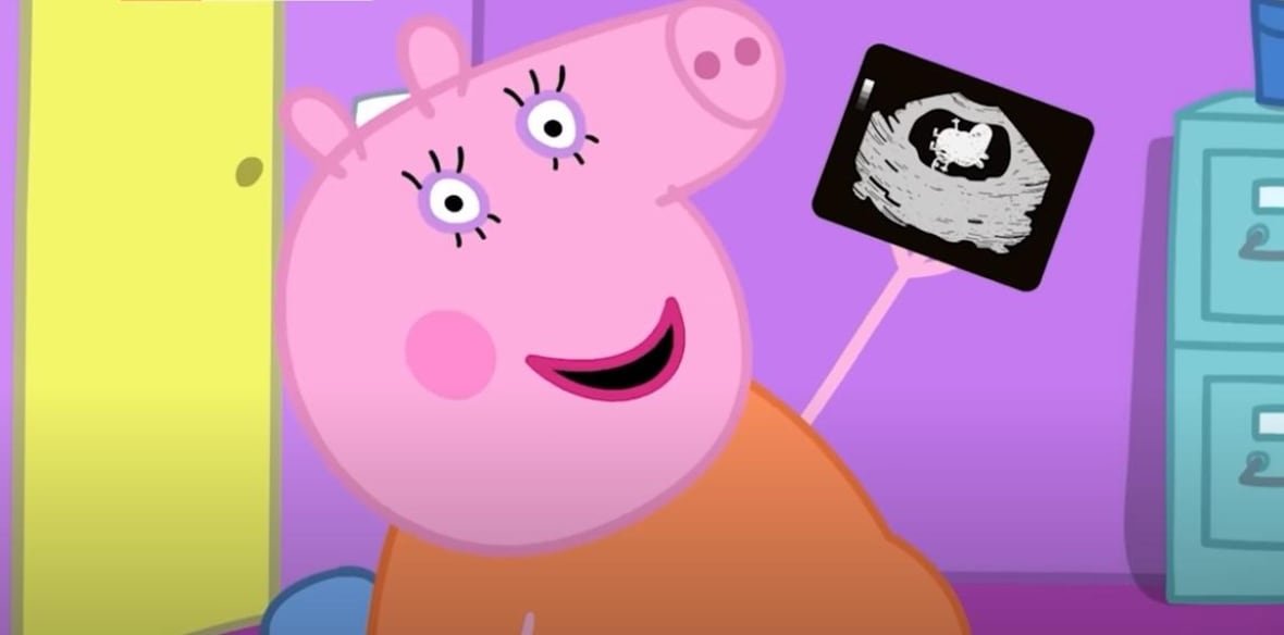 peppa-pig-youtube A cartoon pig holds up a cartoon ultrasound