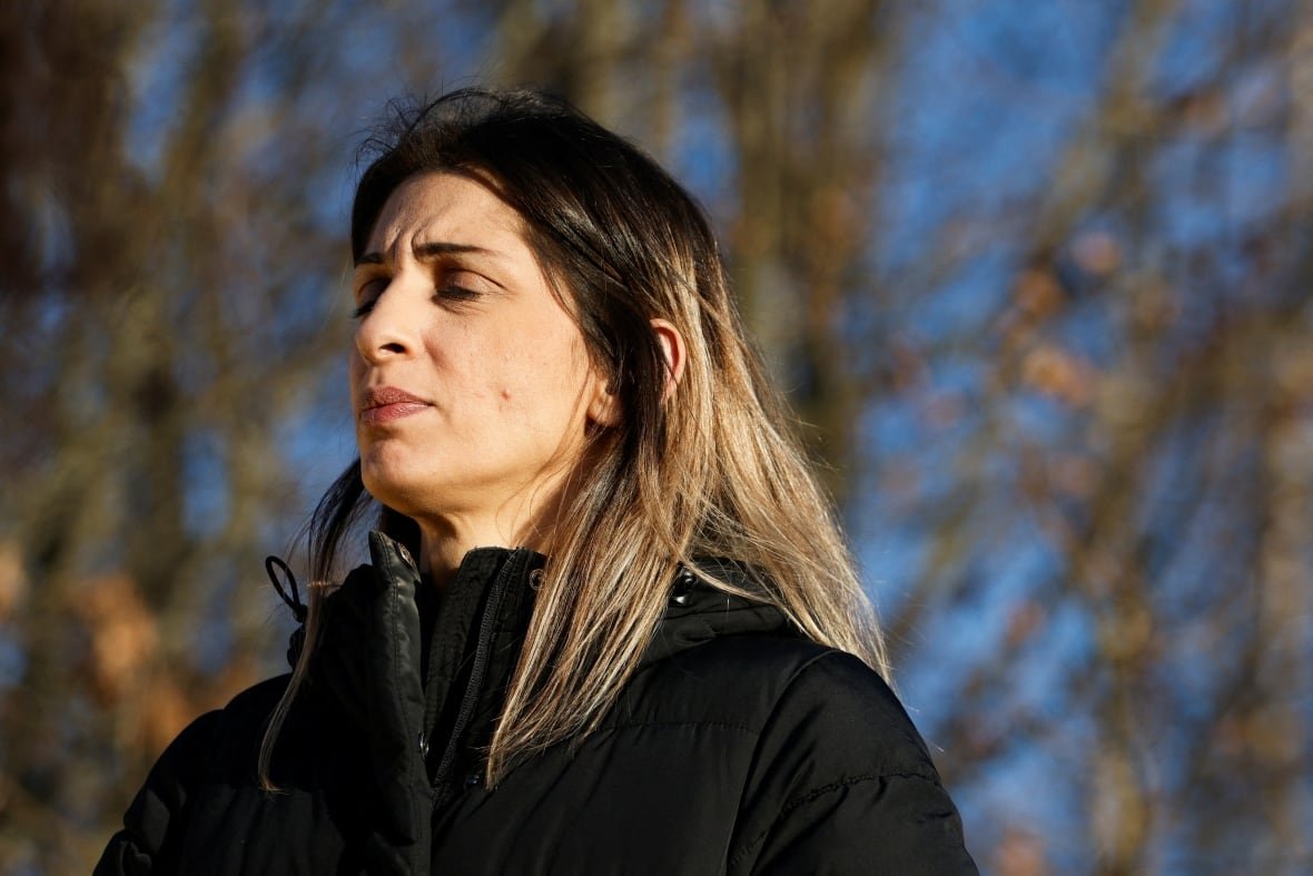 sweden-crime-6 A person closes their eyes while in thought.