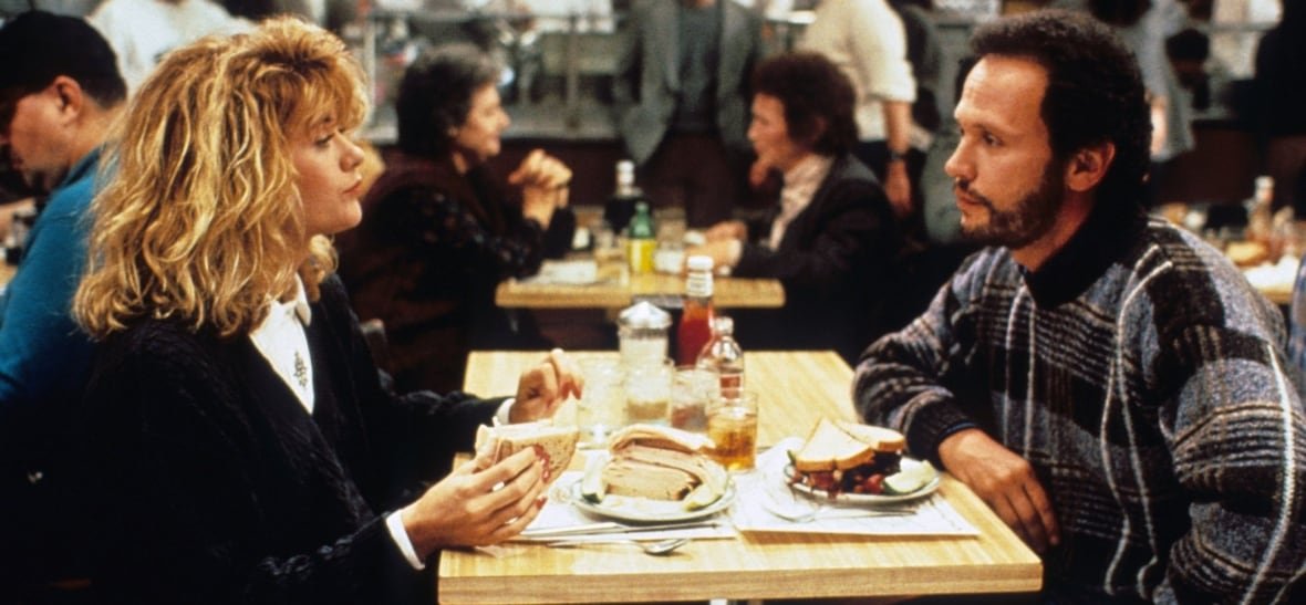 when-harry-met-sally Two people sit at a diner table
