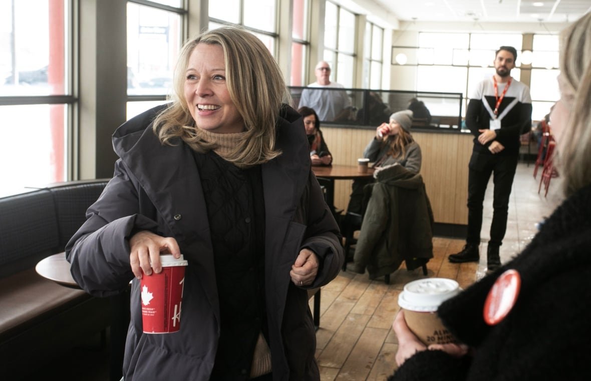 elxn-ont-20250207 Marit Stiles holds a Tim Horton's cup.