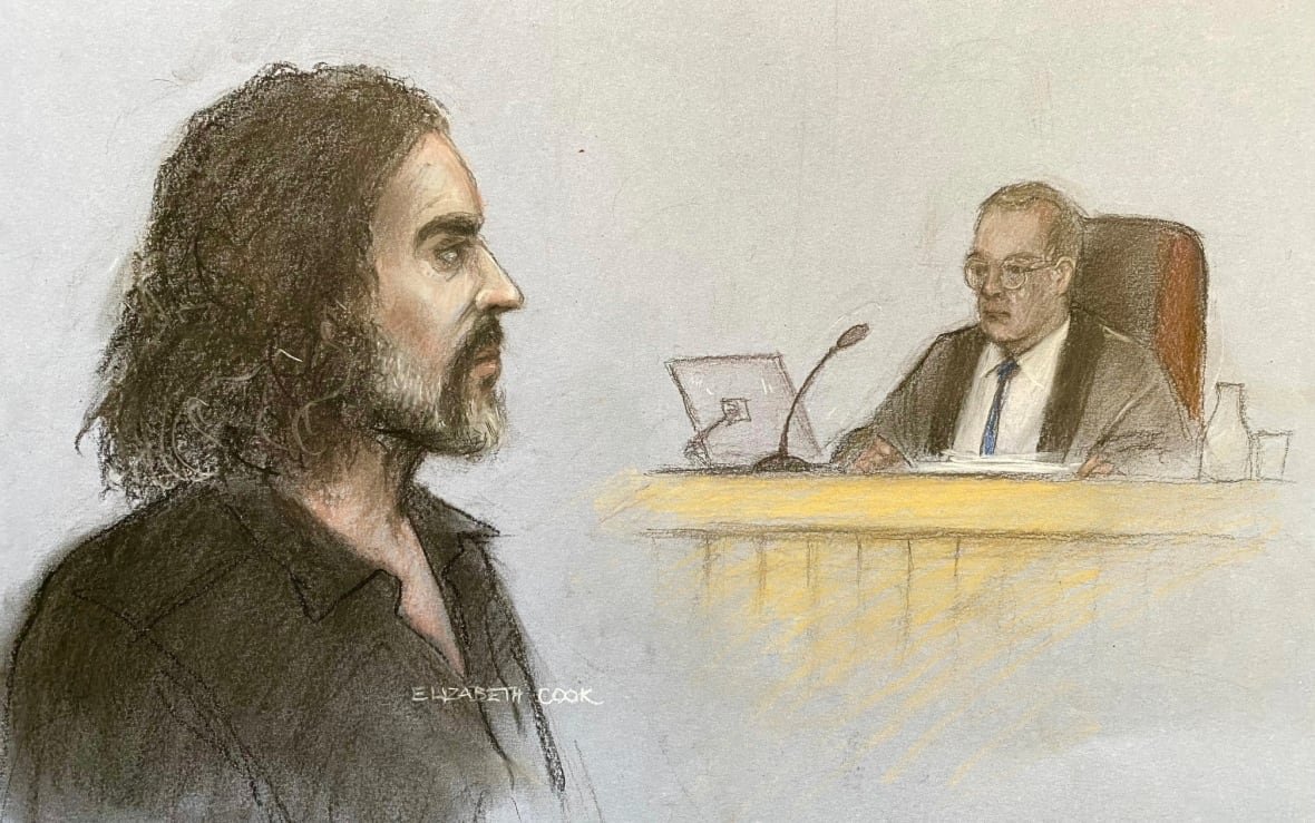 britain-russell-brand-1 A drawing shows a man in profile view, with a judge at a desk visible beyond him.
