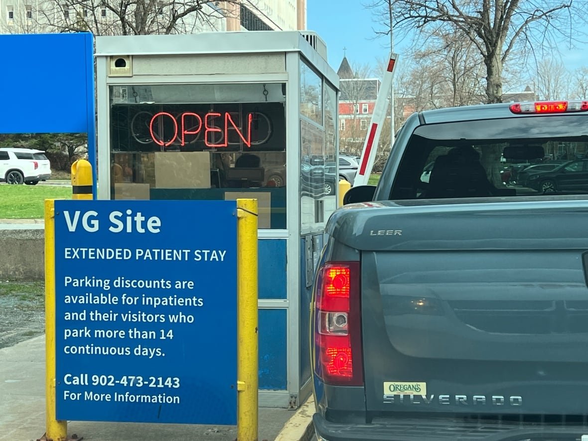 victoria-general-parking-halifax-1 A pick up truck pulls up to a parking booth outside a hospital.