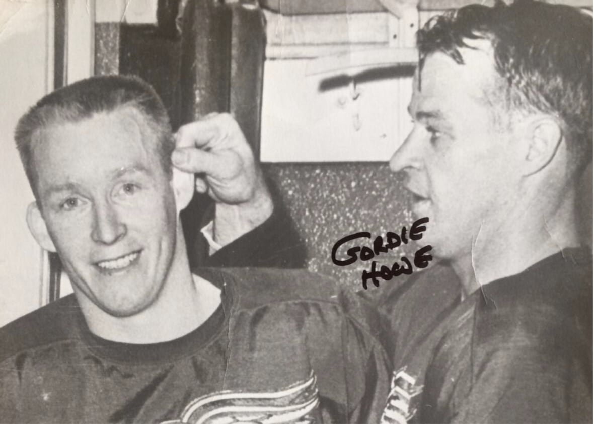 alex-faulkner-5 A black and white photo of two hockey players.