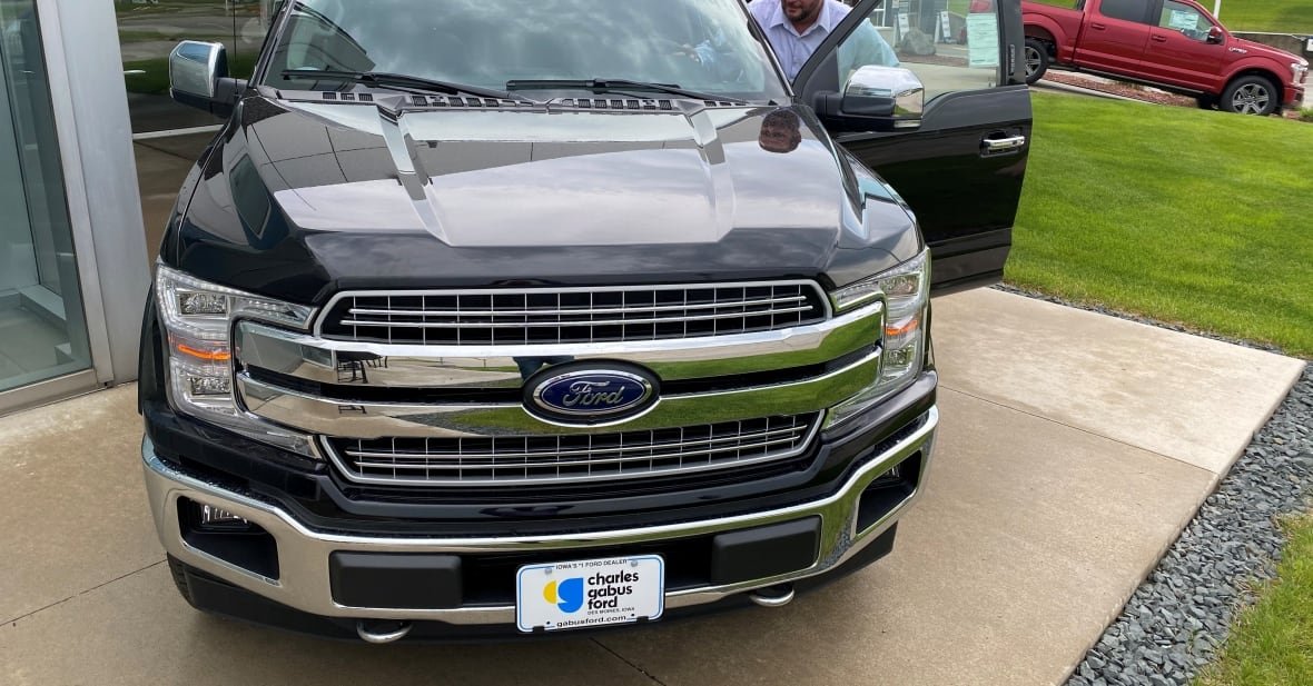 health-coronavirus-autos-trucks Noah Wolter, general manager of Charles Gabus Ford, shows off an F-Series truck that he says are selling really well because of hefty discounts and interest-free loans provided by Ford Motor Co., in Des Moines, Iowa, , Iowa, U.S. May 14, 2020. Picture taken May 14, 2020.