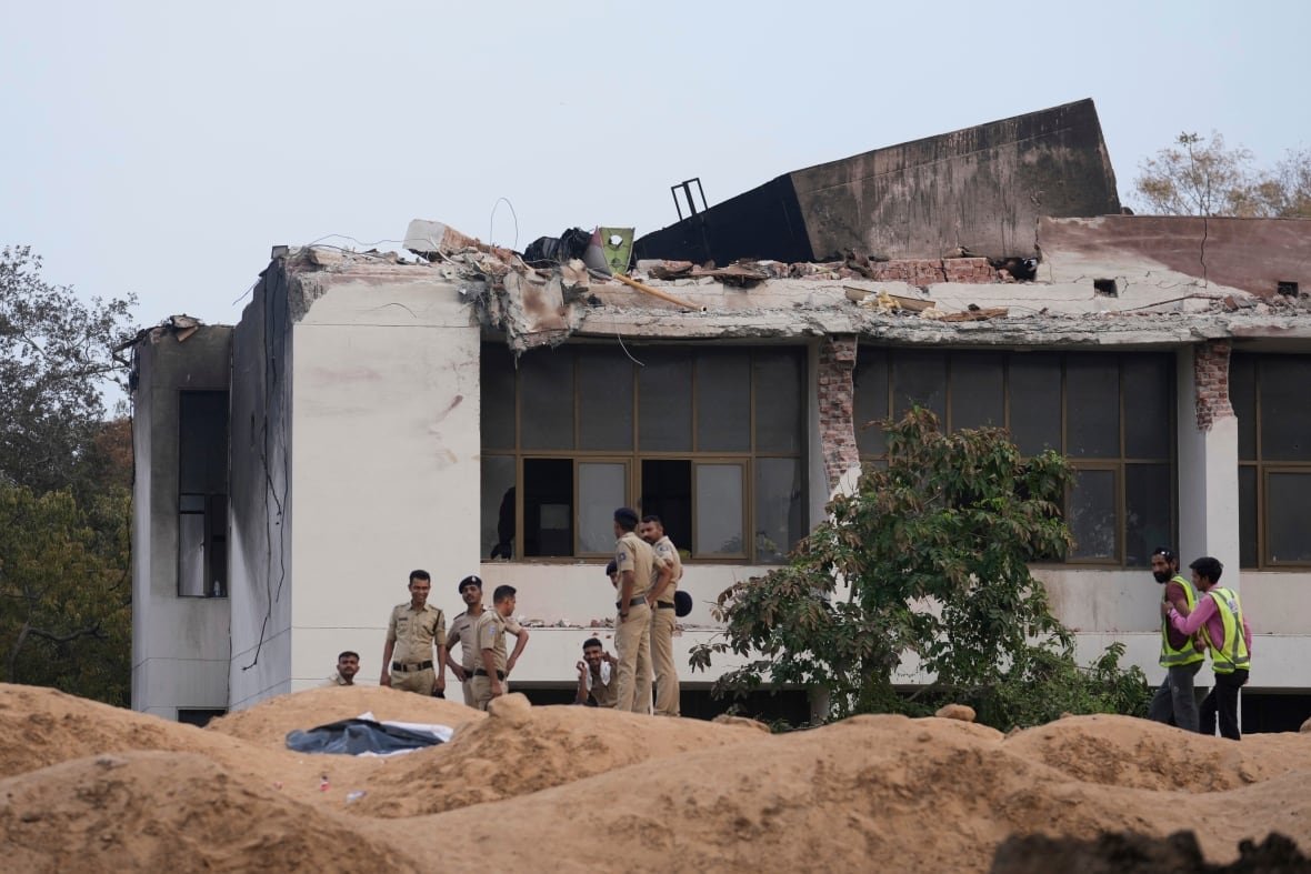 india-plane-crash-9 Scouring crash site