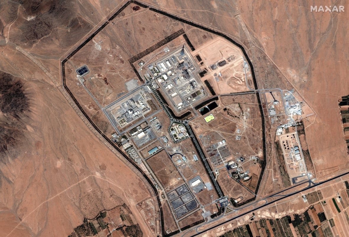 iran-nuclear-contamination-risks-1 An aerial view of buildings in a desert