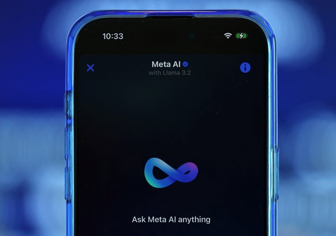 meta-ai-1 A mobile phone displays the logo for Meta's AI chatbot.