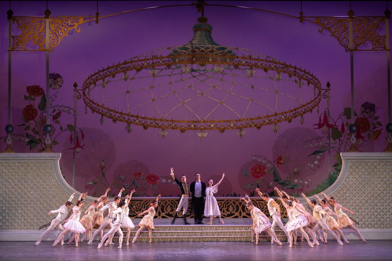 Ballet dancers in costume and on set performing The Nutcracker