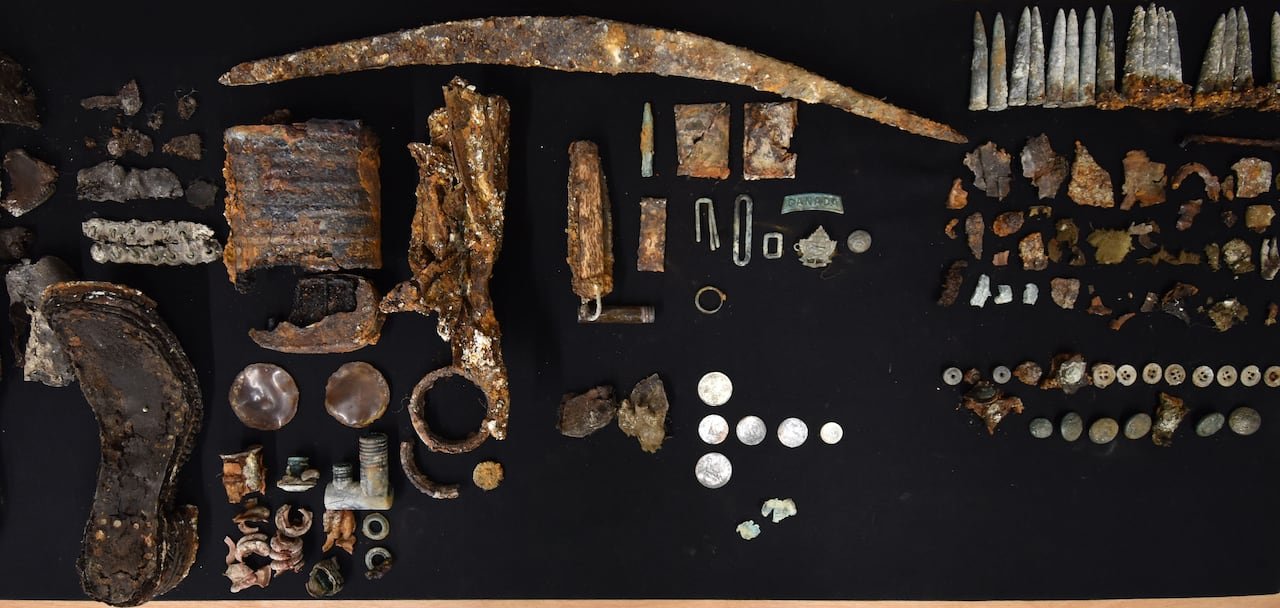 Rusted and worn objects found with a WWI soldier